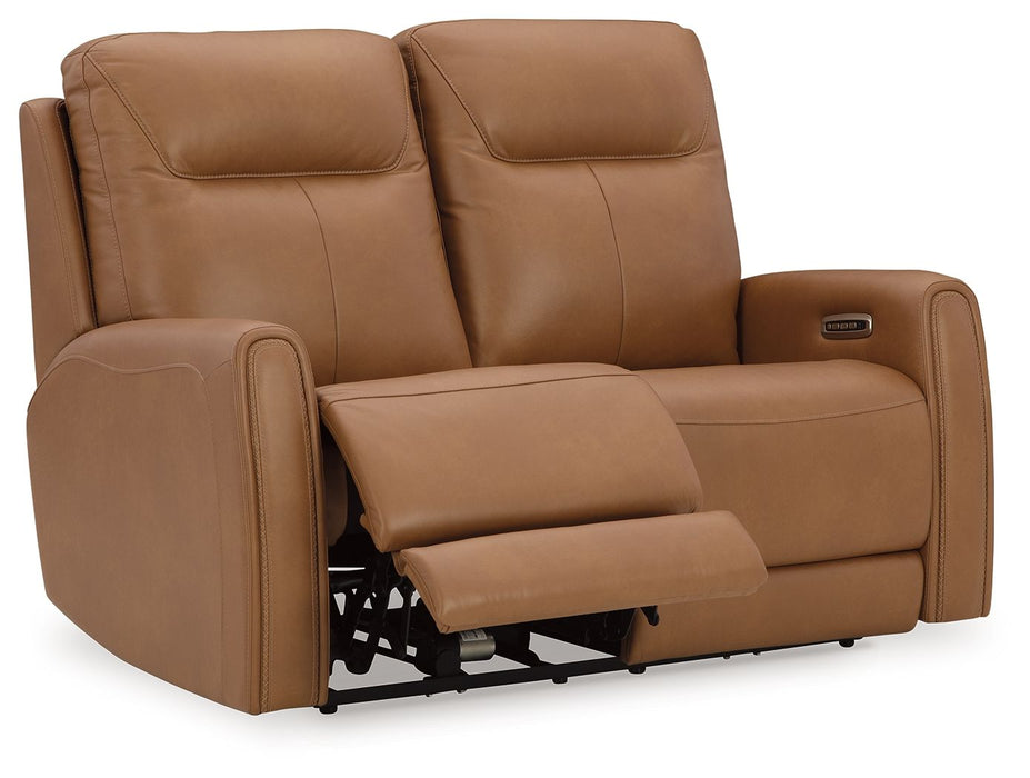 Tryanny - Butterscotch - Power Reclining Loveseat/ Adj Headrest